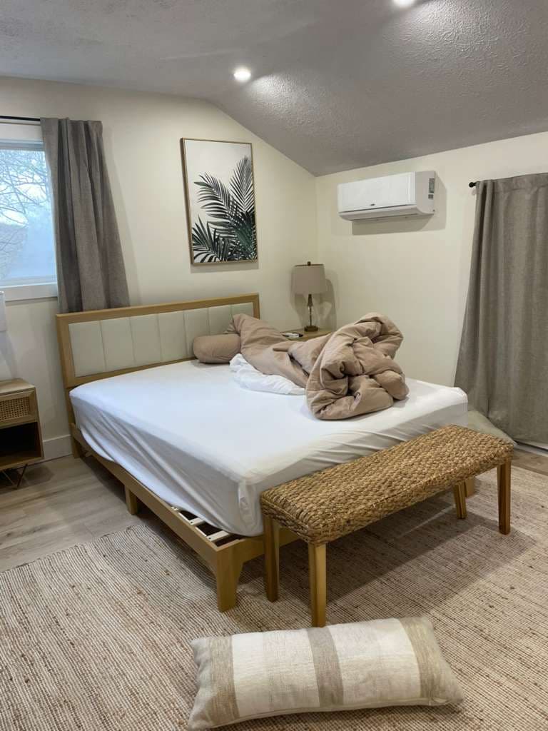 Modern neutral bedroom after cleaning